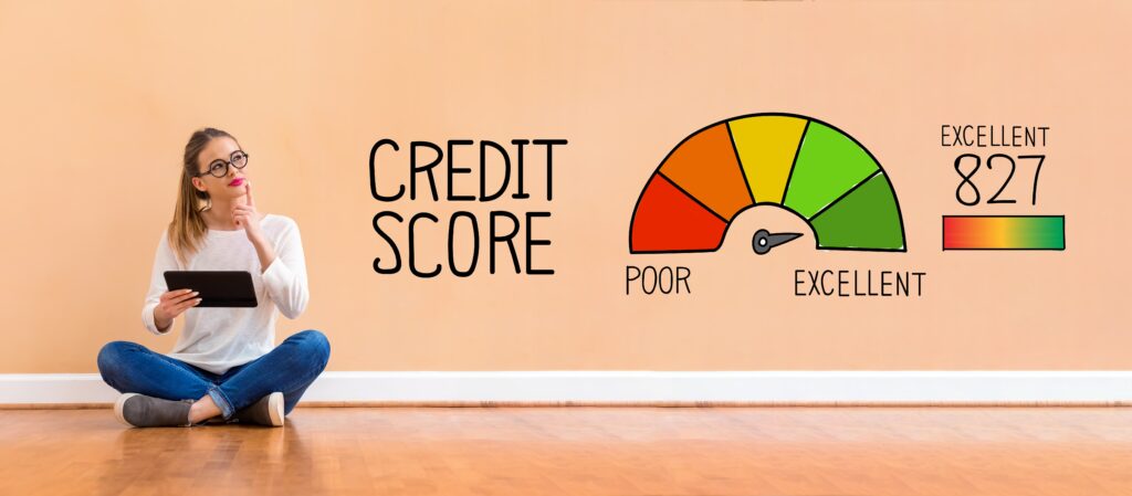 woman sitting next to credit score dial